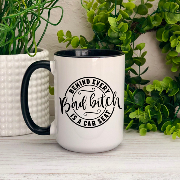 Behind Every Bad Bitch is a Carseat Ceramic Mug