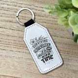 Surviving Motherhood One Meltdown at at Time Glitter Backed Faux Leather Keychain